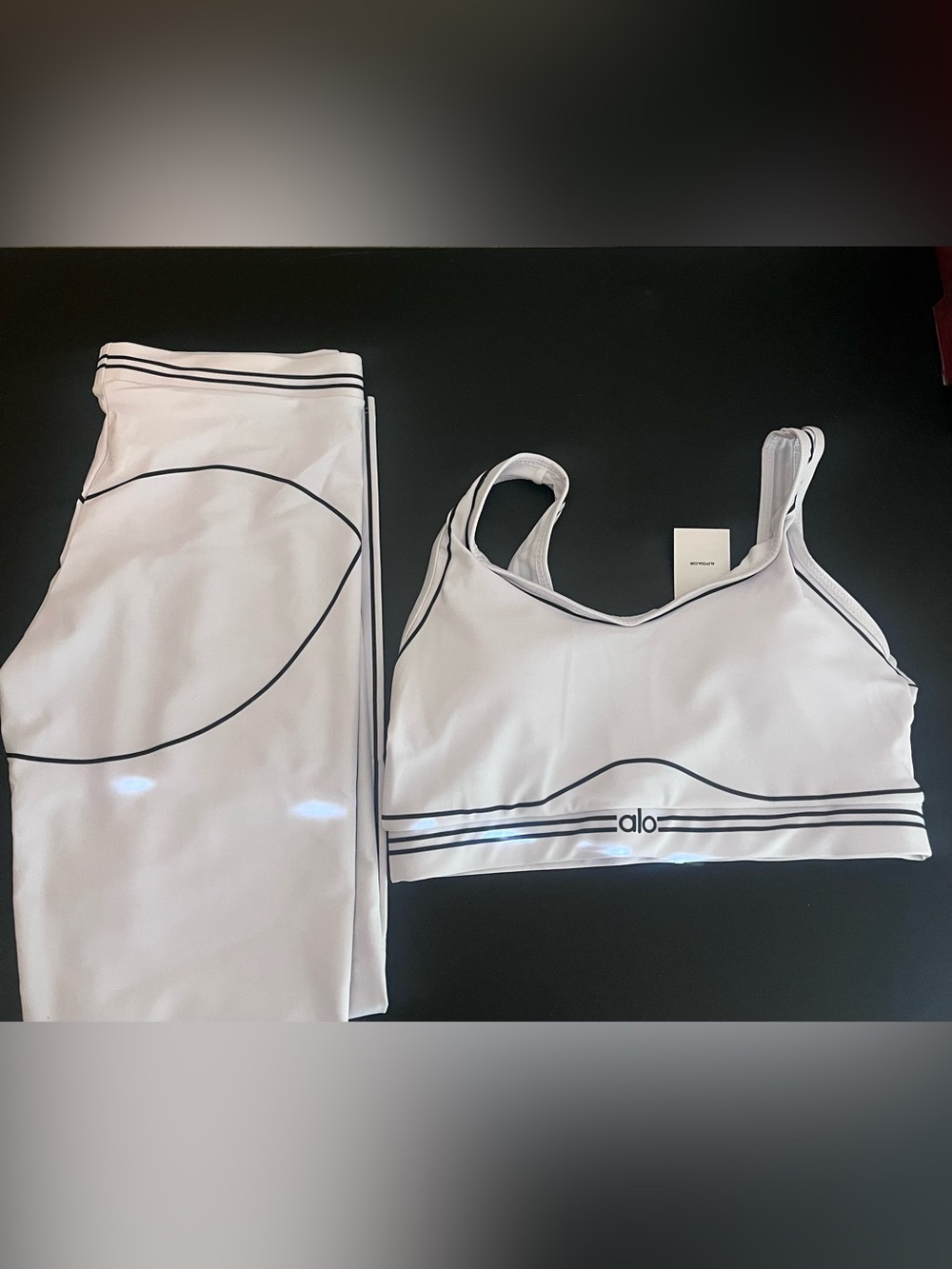 ALO Yoga White Sports Bra and Leggings Set with Black Trim